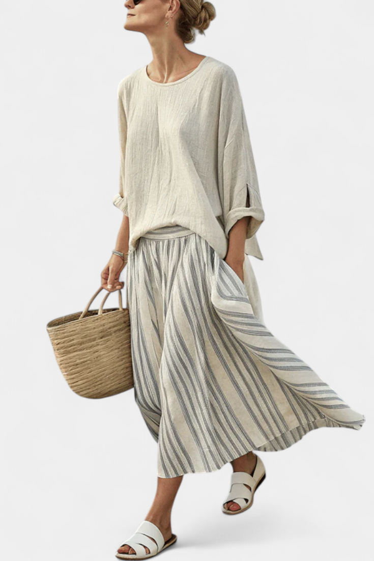 Gia | comfortable blouse and striped midi skirt